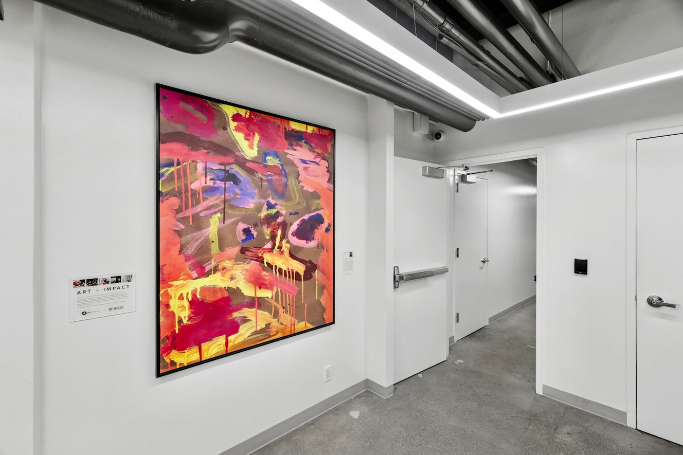 A Fitness Corridor at 475 Sansome  features a vibrant print reproduction by ArtLifting artist Mia Brown, whose energetic brushstrokes and bold color palette bring movement and vitality to the corridor’s clean, industrial design.